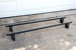 Yakima Q Tower Racks + 58" Round Load Bars. Fixed Price $119.95.
